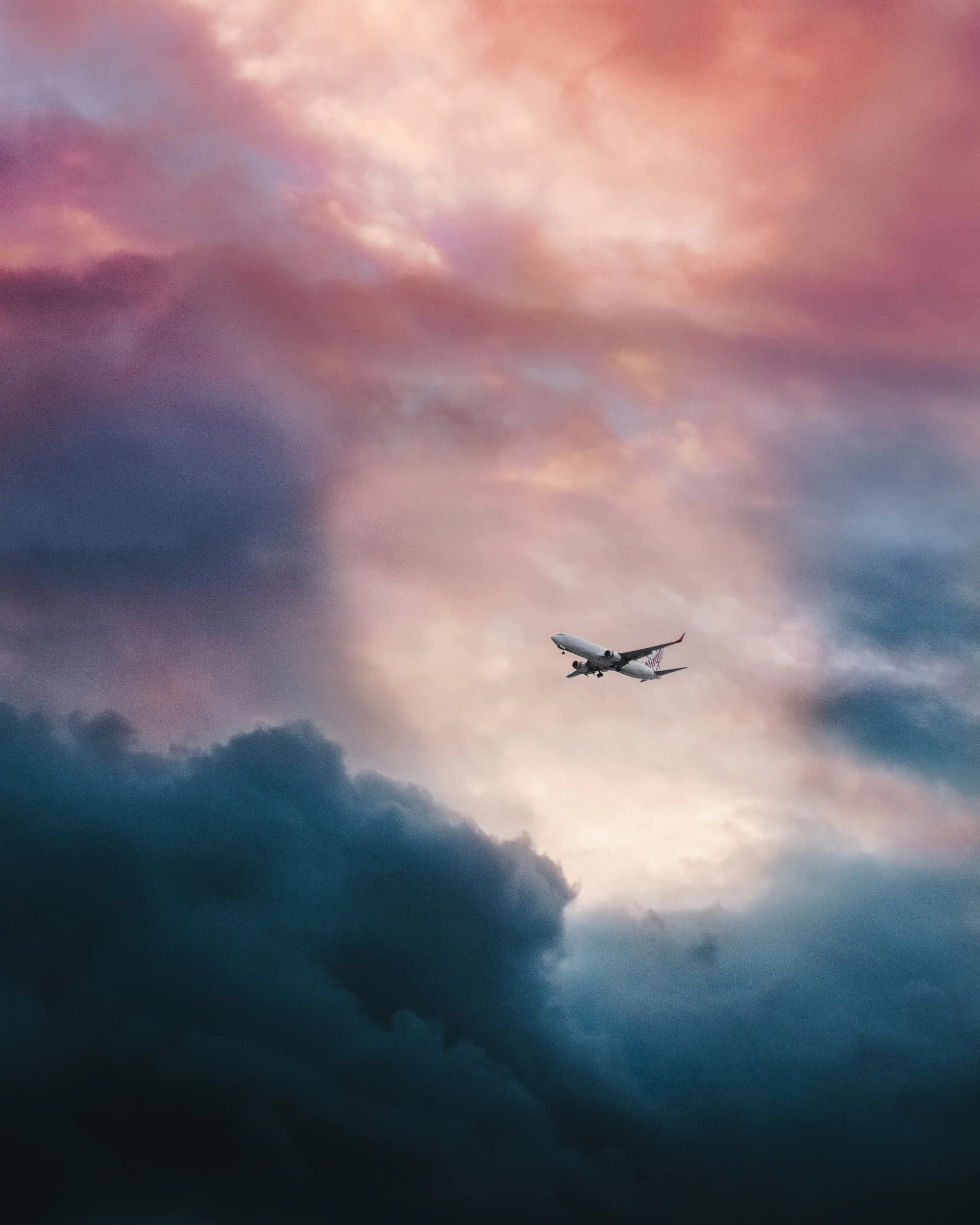 Airplane wing above clouds