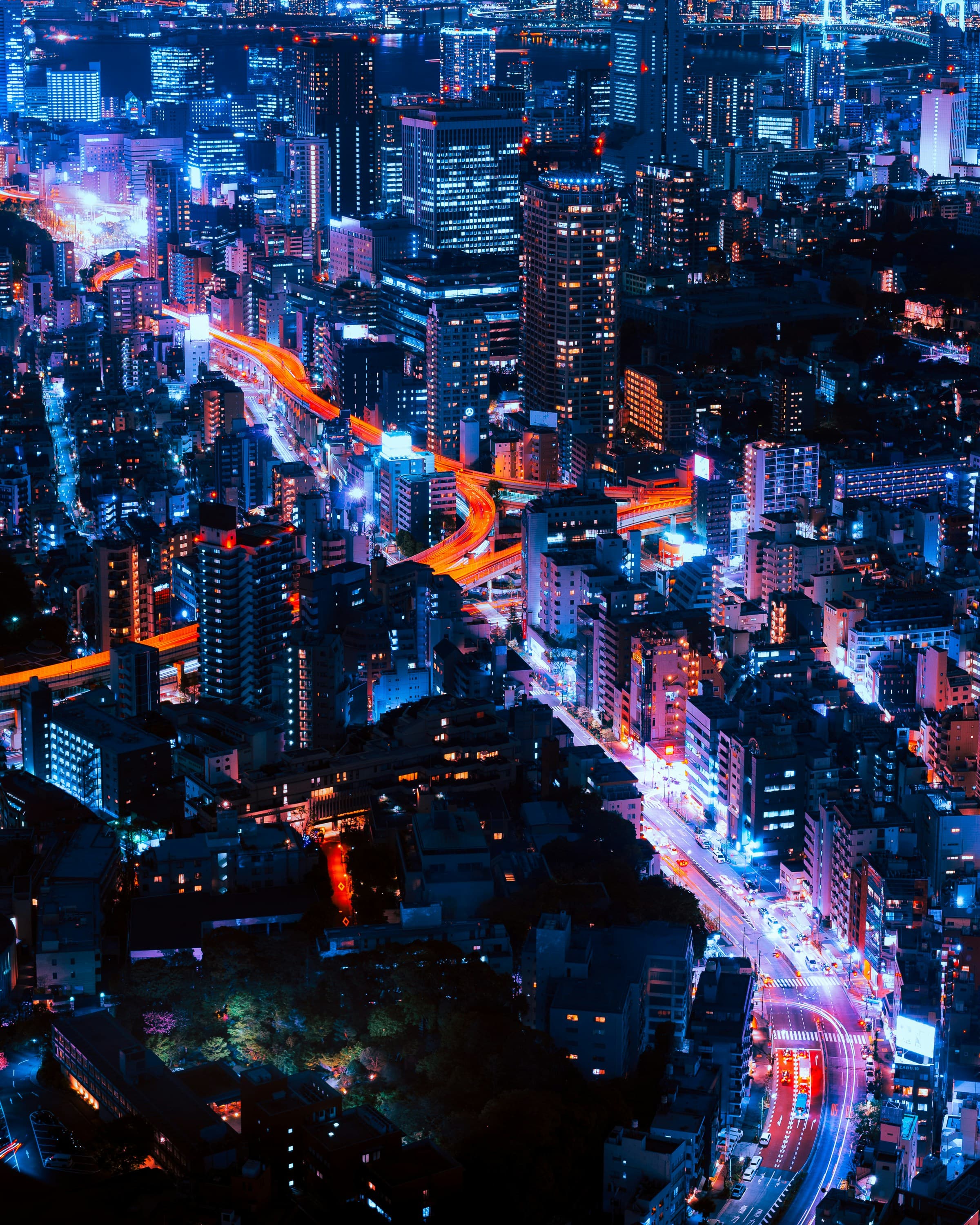 Tokyo at night, a cityscape that recalls the real-world atmosphere behind Your Name
