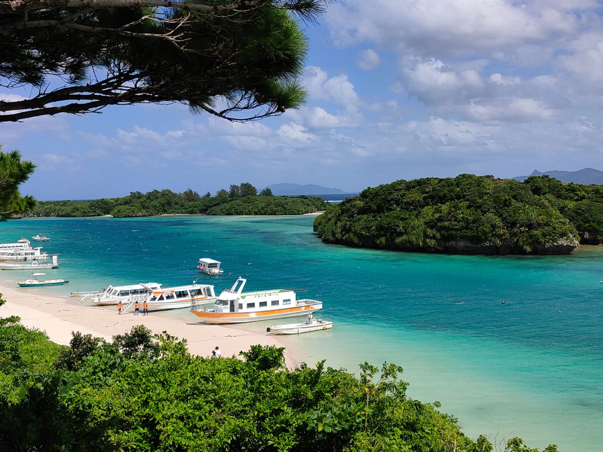 Clear turquoise water and boats in Okinawa