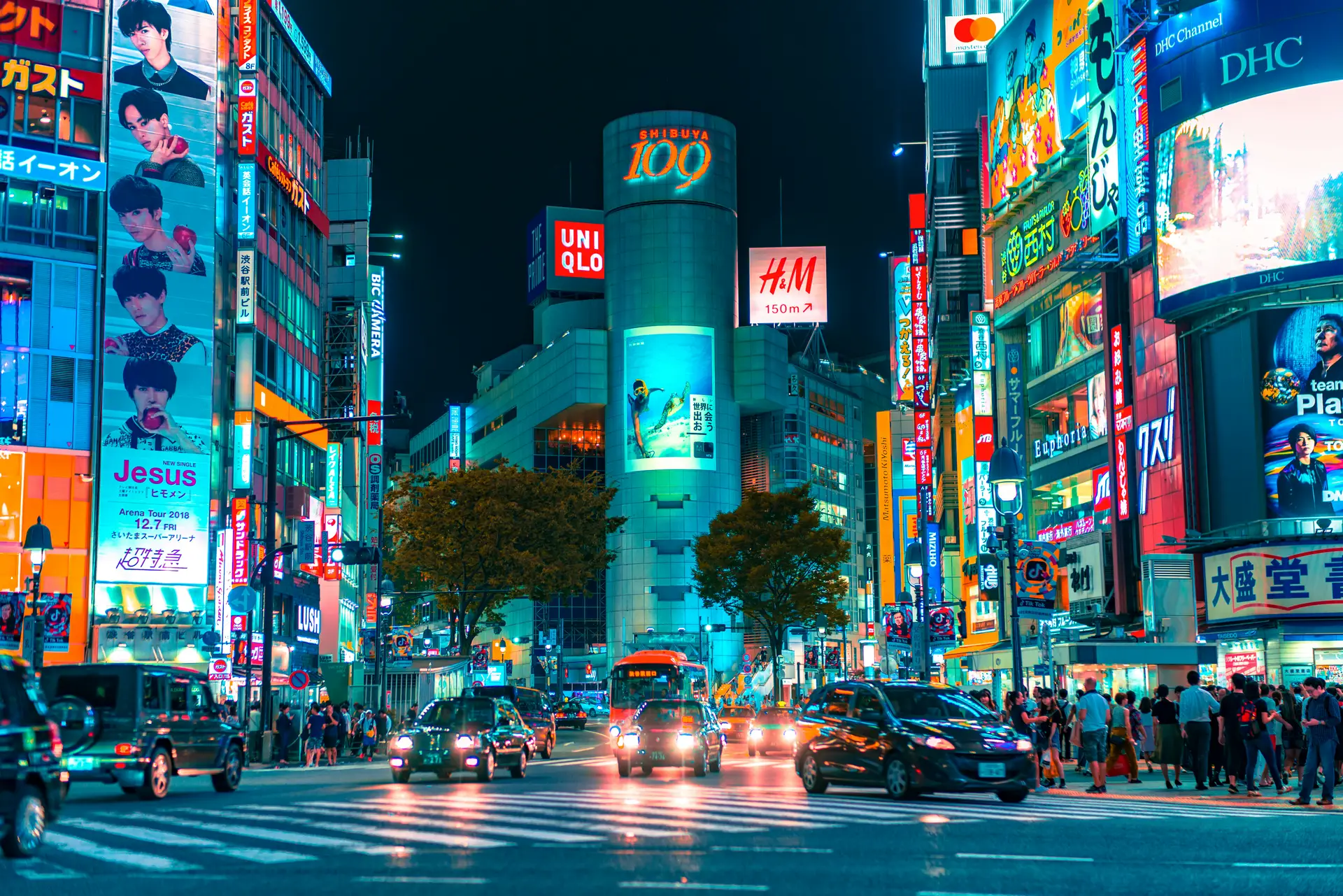 Shibuya crossing and Tokyo city lights